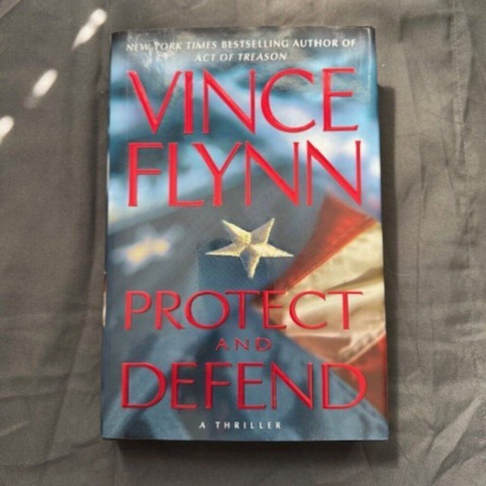 Protect and Defend a Thriller by Vince Flynn - Hardback